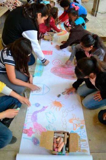 Vista del Valle elementary students create a mural on a Project ARTstART visit to the Pomona College Museum of Art in February.